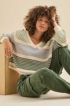 Stay effortlessly stylish with our multi-colored striped sweater. Featuring a flattering V-neck design, it's the perfect blend of comfort and chic, whether you're lounging seaside or heading out for a night under the stars. A Night Under The Stars, Night Under The Stars, Christmas Boots, Altard State, Altar'd State, Under The Stars, Striped Sweater, Christmas Dress, Stripe Sweater