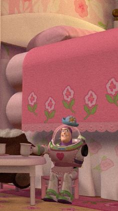 an animated character standing in front of a bed with pink sheets and flowers on it