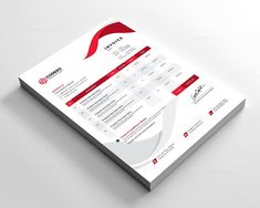 a close up of a white and red business brochure on a gray surface