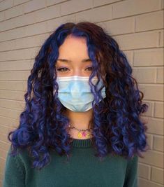 Blue Streaks Curly Hair, Curly Hair With Blue Highlights, Blue Highlights Curly Hair, Wavy Hair Color Ideas, Died Curly Hair, Peekaboo Hair Color Curly, Dye Curly Hair, Curly Blue Hair, Hair Chestnut Brown