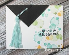 a graduation card with a tasseled cap on it and the words you're so awesome