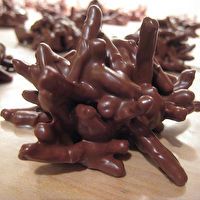 several chocolate candies are arranged on a table