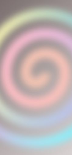 a blurry image of an abstract background with circles in pastel colors, including pink and blue