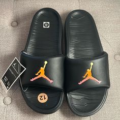 Brand New Nike Air Jordan Break Slide Sandals [Ar6374-008] Black Jumpman Sz 12 Slip-resistant Sandals For Streetwear, Black Slip-resistant Sandals With Round Toe, Black Round Toe Flip Flops With Rubber Sole, Black Non-slip Flat Sport Sandals, Black Casual Sport Sandals With Round Toe, Casual Black Non-slip Sandals, Casual Black Sport Sandals, Comfortable Black Closed Toe Sport Sandals, Black Slip-on Synthetic Flip Flops