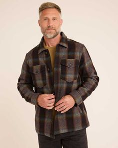 Care and quality in every stitch—that's the hallmark of a Pendleton garment. This men's button-front plaid coat is crafted from 11.3-ounce wool fabric that's naturally stain, odor- and water-resistant. It has a total of five pockets: two button-through chest pockets, two angled welt pockets and one hidden interior pocket. Cotton corduroy trim. Unlined. 100% virgin wool. Fabric woven in our American mills. Imported of USA fabric. | MEN’S PLAID WOOL LAWSON COAT Plaid Long Sleeve Outerwear With Concealed Placket, Plaid Tweed Jacket With Concealed Placket, Plaid Tweed Jacket With Long Sleeves, Classic Plaid Outerwear With Concealed Placket, Classic Plaid Outerwear With Welt Pockets, Classic Plaid Outerwear With Spread Collar, Business Plaid Outerwear With Patch Pockets, Classic Plaid Outerwear With Lapel Collar, Plaid Outerwear With Button Closure And Spread Collar