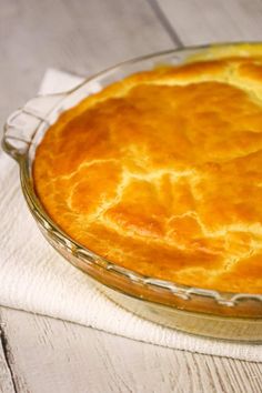 a pie sitting on top of a white cloth