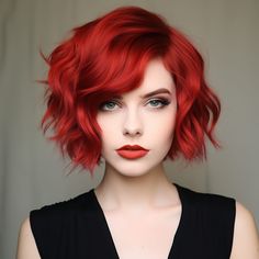 Bold crimson waves bring a touch of magic and intensity to your appearance. The crimson shades infuse a burst of passion and allure into short hair, creating a look that’s both captivating and daring. If you’re seeking a hairstyle that exudes confidence and style, these bold crimson waves are tailor-made for you. Red Short Hair Color, Red Hair Bobs, Red Short Hair Pixie, Red And Teal Hair, Intense Red Hair Color, Vivid Red Hair Color, Red Wavy Bob, Vivid Red Hair, Multi Coloured Hair