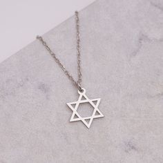 RiverJewelryShop I can make Star Of David Necklace for you with love * QUALITY: * 100% top quality necklaces * All orders are hand crafted * MATERIAL: High Quality 925 Sterling Silver * COLOR: Silver, Gold * FINISH: Polished * NECKLACE COLOR: -Gold -Silver * NECKLACE LENGTH: -12 Inches -14 Inches -16 Inches -18 Inches -20 Inches -22 Inches *PERSONALIZATION: * PACKAGING: All orders come in our pretty packaging that is gift-ready. If you wish I can add gift message. *IMPORTANT IMFORMATION FOR JEWE Magen David Necklace, Star Of David Necklace, Silver Jewelry Cleaner, Necklace Evil Eye, Necklace Star, Pretty Packaging, Gift Message, Evil Eye Necklace, Star Of David