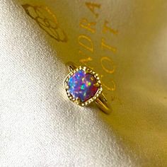 Kendra Scott Davie Gold Band Ring In Lavender Kyocera Opal. Size 6 Available. New! Multicolor Oval Opal Ring For Formal Occasions, Purple Opal Ring, Oval Hallmarked Opal Ring In 14k Gold, Kendra Scott Opal Ring, Purple Opal Ring Gift, Kendra Scott Ring, Rainbow Band, Double Band Rings, Rainbow Rings