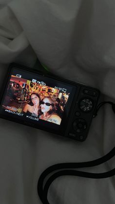 a camera with two women on the screen