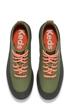 A rubbery platform and ridged midsole boost a retro sneaker-inspired bootie fashioned with a grosgrain pull tab and colorful lace-up ties. 1" platform Lace-up style Cotton upper/textile lining/rubber sole Imported The Platform, Retro Sneakers, Platform Sneaker, Pull Tab, Keds, Up Styles, Bootie, Rubber Sole, Top Brands