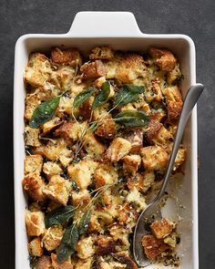 a casserole dish with stuffing and herbs