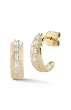 These hoop earrings featuring baguette diamonds are set in 14-karat gold and make the perfect luxe accessory for your lobes. 3/8" drop; 1/8" width Post back Total diamond weight: 0.22ct. Color: G–H Clarity: SI 14k gold/diamond Imported >Diamond Guide 14k Gold Hoop Earrings With Baguette Diamonds, Small Hoop Earrings In Yellow Gold With Baguette Diamonds, Small Hoop Yellow Gold Earrings With Baguette Diamonds, Luxury Yellow Gold Hoop Earrings With Baguette Diamonds, Fine Jewelry Yellow Gold Hoop Earrings With Baguette Diamonds, Yellow Gold Hoop Earrings With Baguette Diamonds, 14k Yellow Gold Hoop Earrings With Baguette Diamonds, 14k Gold Baguette Cut Diamond Earrings, Huggie Hoop Earrings With Baguette Diamonds In Yellow Gold