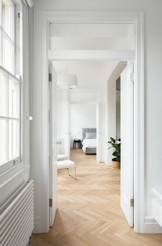 the instagram page on instagram shows an image of a room with white walls and wood