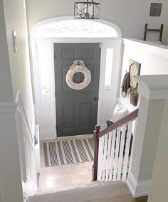 the entryway is clean and ready to be used as a place for wreaths