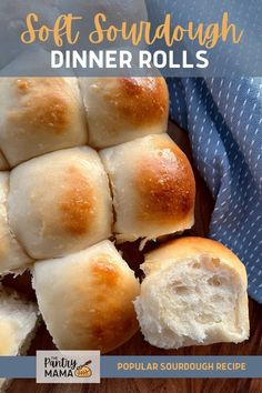 soft sourdough dinner rolls on a cutting board