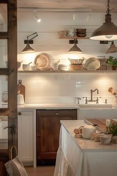 the kitchen is clean and ready to be used for cooking or baking, while also being used as a dining area