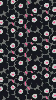 a black and white flower pattern with pink accents