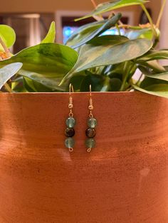 tones of green, brown, and gold bring about a beautiful earthy feel, fitting in well with any outfit! Earthy Green Dangle Earrings, Earthy Green Drop Earrings, Earthy Gifts, Earthy Girl, Tiger Eye Earrings, Earthy Jewelry, Brown Earrings, Girl Accessories, Eye Earrings