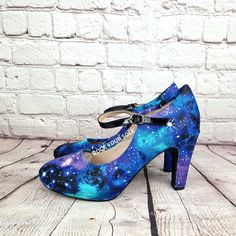 Rock your style with awesome galaxy custom shoes. Great gift for her! Friend, girlfriend or any female, who doesn't love shoes? just under 4inch height (10cm) These shoes have been lovingly fabric covered to give a unique look. They have a waterproof and stain resistant coating. If this is not your type of the shoes or design please get in touch for a custom order. Would love to make something totally unique! Heels used will vary between 4 inches and 5.5 inches high, and heel shape/style may var Galaxy Shoes, Galaxy Wedding, Size 12 Heels, Purple Tissue Paper, Unique Heels, Galaxy Fashion, Friend Girlfriend, Goth Women, Blue Pastel