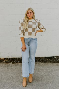 Our Checker Knit Sweater is made with cute puff sleeves and is available in Taupe. It has a ribbed crew neckline, hem, and cuffs. Made with: 52% ACRYLIC 35%COTTON 13% POLYESTER Available in women's sizes Small, Medium, and Large. Chic Fall Knit Top With Puff Sleeves, Chic Puff Sleeve Knit Top For Fall, Casual Cropped Sweater With Puff Sleeves For Fall, Fall Textured Knit Top With Puff Sleeves, Fall Textured Knit Puff Sleeve Top, Fall Ribbed Sweater With Puff Sleeves, Fall Ribbed Puff Sleeve Sweater, Ribbed Puff Sleeve Sweater For Fall, Winter Casual Fitted Puff Sleeve Top