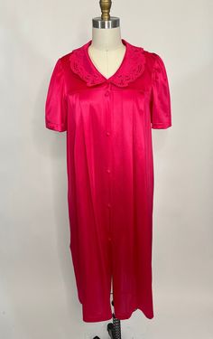 "This is a vintage Vanity Fair Nightgown. It is a bright pink, short sleeved nightgown in a nylon fabric. It has short sleeves and buttons up the front and features a cutaway nylon collar and pleats down the front. It is in excellent vintage condition. Size: medium Bust: 40\" Hips: 50\" Length: 40\"" Pink Summer Sleepwear With Button Closure, Pink Button Closure Sleepwear For Spring, Spring Pink Sleepwear With Button Closure, Pink Sleepwear With Button Closure For Spring, Summer Short Sleeve Buttoned Sleepwear, Summer Short Sleeve Sleepwear With Buttons, Summer Sleepwear With Buttons And Short Sleeves, Red Short Sleeve Sleepwear, Vintage Short Sleeve Nightgown