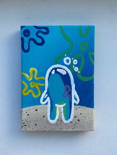 an octopus painting on a canvas mounted to a wall