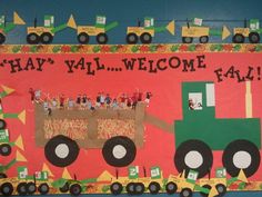 a bulletin board with a tractor and farm scene on the front, says hay vall welcome fall