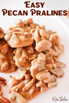 pecan pralies on a white plate with nuts