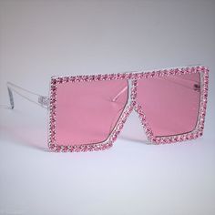 Another stunning version of our Como shades! How nice are these? Complete with crystal/rhinestone embellishments for the ultimate bling! They'll have you standing out from the crowd for all the right reasons! Style: Square with crystal embellished frame. Lens Height: 6.5 cm Lens Width: 6.8 cm UV400 Protection Luxury Elegant Shield Sunglasses For Party, Elegant Luxury Shield Sunglasses For Parties, Luxury Rimless Shield Sunglasses For Formal Events, Luxury Rimless Shield Sunglasses For Formal Occasions, Cheap Elegant Rhinestone Sunglasses, Candy Frame, Pretty Sunglasses, Big Glasses, Luxury Glasses