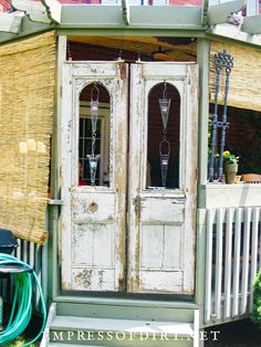 an old door with two glass doors and windows in the garden - emp on instagram