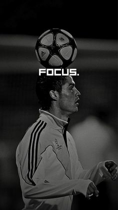 a black and white photo of a soccer player with the words focus on his forehead