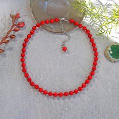 "Length:14\"L. Extender: 2\"L. Major Beads: Red Coral matte finish 10MM. Color: Red. Style: Hand-knotted choker necklace. Finding: None. Clasp: Stainless Steel lobster claw clasp and extender. https://www.etsy.com/shop/MYGEMSROCK" Red 8mm Bead Necklace, Red Necklaces With 8mm Beads For Jewelry Making, Red Coral Jewelry With 8mm Beads, Red Crystal Necklaces With Gemstone Beads, Red Crystal Necklace With Gemstone Beads, Elegant Red Beaded Necklace With Lobster Clasp, Adjustable Red Crystal Necklace With Gemstone Beads, Red Crystal Necklaces With Gemstone Beads For Gift, Red Round Beaded Necklaces For Valentine's Day