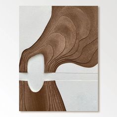 an abstract painting with brown and white colors on the wall, in front of a white background