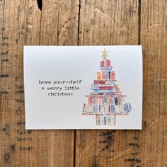 a christmas tree made out of books with the words have you - she? a merry little christmas