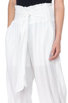 White Knit Eyelet Pants 100% Polyester Illet Long and flowy waist pants with tie belt Casual White Tie-side Bottom Pants, White Pants With Elastic Waistband And Tie-side, Casual White Tie-side Pants, Casual White Pants With Tie-side Bottom, White Summer Pants With Tie Waist, White Tie-side Bottom Pants For Spring, White Tie Waist Beach Pants, White Tie Waist Pants For The Beach, White Beach Pants With Tie Waist