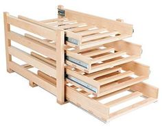 three wooden drawers are stacked on top of each other in order to be used for storage