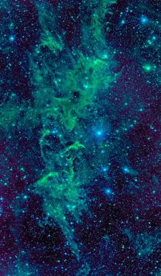 an image of the sky with many stars and green light on it's side