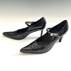 "Vintage Emporio Armani brown pointed Mary Jane heels. Very 90s Y2K style. Narrow heel. High-quality leather upper, leather interior. The soles with signs of wear.  Narrow strap with silver metal buckle in rectangular shape. Condition: wrinkles on the front, leather in very good condition, heel without chips.  SIZE: 5UK 38EU Heel: 8cm/3\" External width: 8.5cm Tip to back of the heel: 25cm" Leather Kitten Heels With Buckle For Office, Leather Kitten Heels With Buckle Closure For Office, Business Heels With Buckle Closure And Pointed Toe, Pointed Leather Heels For Formal Occasions, Formal Patent Leather Kitten Heels With Buckle Closure, Pointed Leather Kitten Heels For Office, Formal Almond Toe Kitten Heels With Buckle, Vintage Heels With Buckle Closure And Pointed Toe, Pointed Toe Leather Kitten Heels For Formal Events