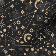 a black background with gold stars and crescents on the bottom, in different sizes