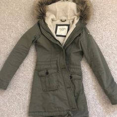 Sherpa Lined Jacket Inside. Very Cozy And Comfortable. Only Worn Once! Price Is Negotiable/Willing To Accept Reasonable Offers Fitted Cozy Hooded Outerwear, Cozy Fitted Hooded Outerwear, Cozy Fitted Outerwear With Pockets, Fitted Cozy Outerwear With Faux Fur Trim, Abercrombie Faux Fur Mini Puffer, Hollister Fur Jacket, Sherpa Hooded Outerwear With Double-lined Hood, Abercrombie Camo Hoodie, Abercrombie Patchwork Hoodie