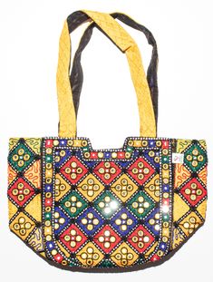 Discover Sindhi Artistry with this vibrant embroidered tote bag. Crafted with meticulous beadwork and mirror accents, it reflects the rich cultural heritage of Sindhi artisans. Made from durable fabrics, this one-of-a-kind bag is both stylish and functional. The spacious interior and sturdy crossbody strap make it perfect for everyday use. Add a touch of ethnic charm to any outfit with this unique accessory. Traditional Bags With Multicolor Embroidery And Motifs, Rectangular Handwork Festival Bag, Multicolor Potli Bag For Daily Use, Festive Rectangular Bag With Mirror Work, Daily Use Multicolor Potli Bag, Rectangular Multicolor Embroidery Bag For Festivals, Traditional Rectangular Shoulder Bag With Motifs, Rectangular Shoulder Bag With Multicolor Embroidery, Multicolor Embroidered Rectangular Shoulder Bag