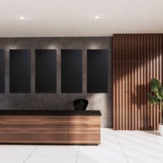 a modern reception area with black and wood accents