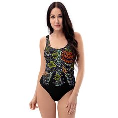 Dare to be different in this Halloween Inside One-Piece Swimsuit with a daring ribcage botanical design and playful Jack O Lantern heart. The quick-dry 4-way stretch material is form-fitting and comfortable. Perfect for any Halloween lover! DETAILS • 82% Polyester, 18% Spandex • Fabric weight: 6.78 oz/yd² (230 g/m²), weight may vary by 5% • Chlorine-resistant fabric • Cheeky fit with a scoop neckline and a low scoop back • Zig-zag stitching • Double-layer front • Four-way stretch material stretc Dare To Be Different, Botanical Design, Rib Cage, Jack O Lantern, Spandex Fabric, Zig Zag, Scoop Neckline, One Piece Swimsuit, Double Layer