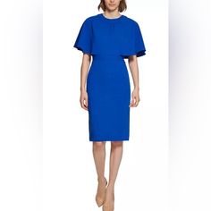 Bring Out Your Sophisticated Style With This Sheath Dress From Calvin Klein, Framed With Chic Capelet Sleeves. Runs True To Size Tailored Fit Through The Chest, Waist, And Hips; Sits Close To The Body Scuba Crepe: Stretchy And Supportive Crewneck; Sheath Silhouette Concealed Back Zipper Closure Elbow-Length Capelet Sleeves Banded Waist Lined Polyester/Spandex; Lining: Polyester Dry Clean Like New - Never Worn Blue Flutter Sleeve Midi Dress For Evening, Elegant Blue Midi Dress With Flutter Sleeves, Calvin Klein Sheath Midi Dress For Office, Blue Fitted Mini Dress With Flutter Sleeves, Summer Office Dresses By Calvin Klein, Calvin Klein Spring Midi Dress For Office, Elegant Blue Calvin Klein Dress, Calvin Klein Blue Evening Dress, Calvin Klein Summer Office Dresses