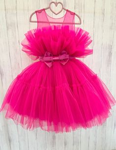 Fancy Pink Girl tulle dress Baby dress First Birthday outfit Pink girl dress Photoshoot girl dress Toddler party dress Fancy dress girl If your little girl is having a birthday or invited to a party, this puffy tulle dress with cotton lining is simply essential. With this special occasion dress girls will be little fairies at any wedding, anniversary or birthday event. The dress special design has been created for making your girl look really tender and awesome. Size: from 6-9 monthes to 14 sizes Material: tulle, cotton lining Making: 3-5 days Colors: neon pink, red, white, black, beige, yellow, orange, blue If you want another color please contact me. More than 100 colors available. Delivery: 14-25 days for USA, 10-21 days Europe. USPS, DHL Express, Fedex, Ukrposhta Care: Hand Wash in col Rose Photoshoot, Birthday Outfit Pink, Outfit Rosa, Toddler Party Dress, Girls Tulle Dress, Dress Photoshoot, Robes D'occasion, Dress Fancy, Girls Special Occasion Dresses