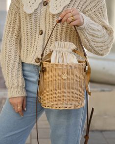 Crossbody wicker round bucket basket for women with adjustable leather long and short straps, have inside cotton bag. It is carefully hand-made by local artisans. This fashionable, stylish and environmentally-friendly basket is perfect for everyday use or going out. Basket have fantastic proportions and handle that perfectly fit into your hand. Wicker basket can be ideal gift for your mum, sister or friend! Features: - a precisely handmade basket made in Lithuania - made from all-natural, eco-fr Picnic Shoulder Bag With Adjustable Strap, Trendy Shoulder Bag With Braided Handles For Picnic, Trendy Natural Shoulder Bag For Picnic, Trendy Rattan Basket Shoulder Bag, Spring Woven Shoulder Bag For Picnic, Trendy Natural Color Bucket Bag With Top Handle, Spring Straw Top Handle Shoulder Bag, Trendy Handwoven Beige Bucket Bag, Spring Picnic Tote Shoulder Bag