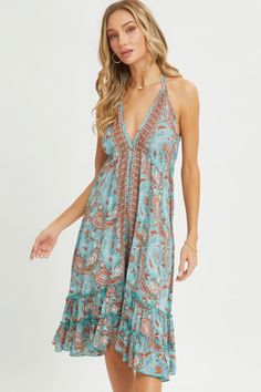 Elevate your wardrobe with our Halter Paisley Dress, a versatile piece that seamlessly blends comfort and style. Crafted with attention to detail, this dress is designed to enhance your silhouette while offering effortless elegance.Key Features:- Fabric: Crafted from 100% Rayon, this dress offers a luxurious feel and drapes beautifully on the body.- Fit: Featuring a relaxed fit, this dress ensures comfort while exuding a feminine silhouette.- Color: Available in a refreshing Aqua hue.- Sizes: Of Chic Beachwear, Paisley Border, Women Halter, Dress Crafts, Midi Dress Summer, Paisley Dress, Dress Measurements, Effortless Elegance, Tiered Skirt