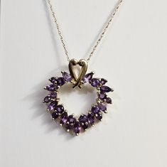 10k Yellow Gold Amethyst Heart Necklace! Stamped 10k On The Chain And Back Of The Pendant. Chain Is 18 Inches Long. See All Pics For More Info Including Size. Great Necklace! See My Other Listings For Sterling Silver, Solid 10k, 10kt, 417 , 585, Solid 14k, 14kt Solid 18k, 18kt, Diamonds, Sapphire, Emerald, Garnet, Jade, Amethyst, Citrine, Ruby, Topaz, Other Precious Stones, And Other Jewelry Key Words: Kay's, Jared, Zales, Engagement, Anniversary, Birthday, Valentines, Vintage, Unique, Art Deco Zales Engagement, Valentines Vintage, Alexandrite Jewelry, Amethyst Heart, The Chain, Engagement Anniversary, Purple Gold, Heart Necklace, Unique Art