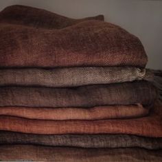 a stack of linens sitting on top of each other